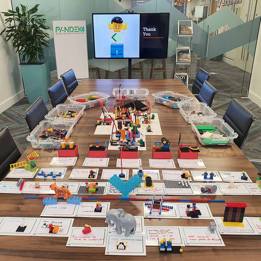 Board room full of LEGO models on the table